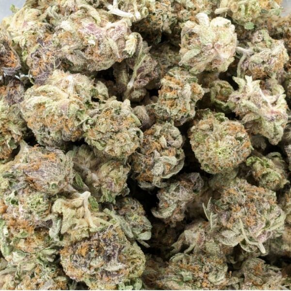 A close up photo of pink bubba buds in a bag