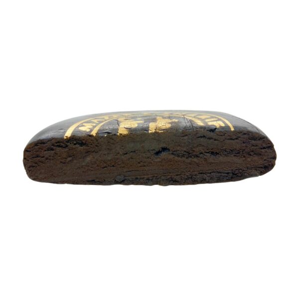 Afghan Mazar Sharif Hash cut in half on a white background