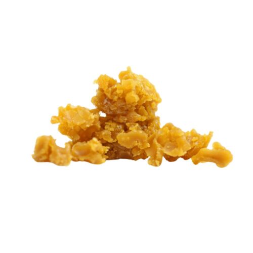 Close-up image of Crumble Hash, showcasing its soft, breakable texture with earthy hues and a rich, malleable consistency. Perfect for smoking, vaping, or mixing with flower.