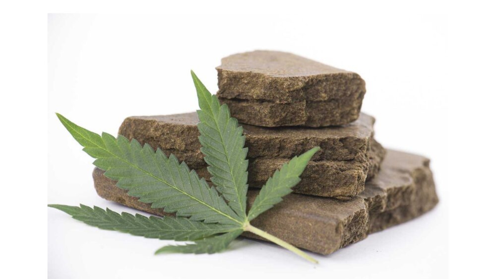 An image of hash with a cannabis leaf on a white background.
