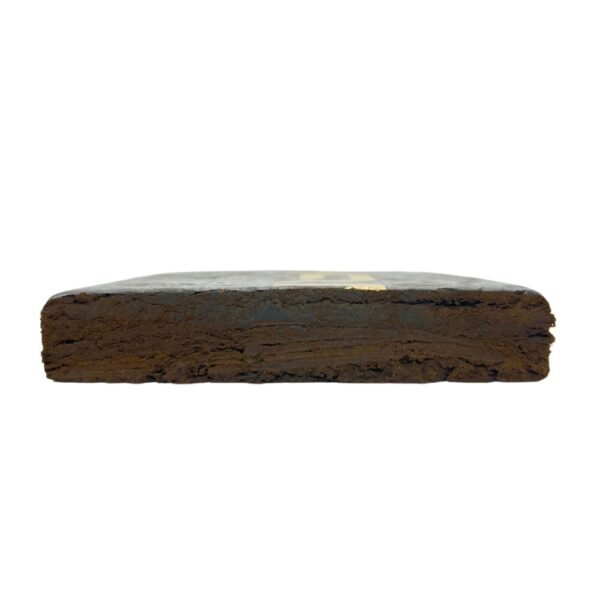 An image of AMG Hash cut in half showcasing the inside of the brick on a white background