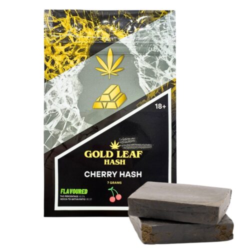 An image of cherry hash on a white background with gold leaf hash packaging