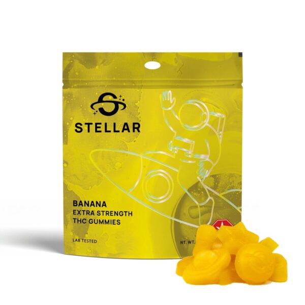 An image of Stellar Banana Gummies showcasing the gummies next to the orange packaging on a white background