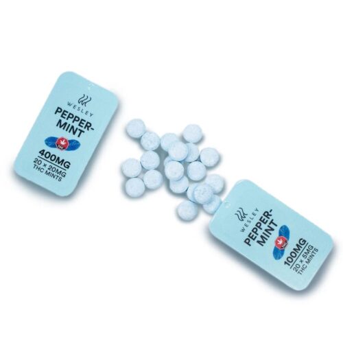 An image of Wesley – THC Peppermints displayed on a clean white background, with several mints spilled out to highlight the product's appearance