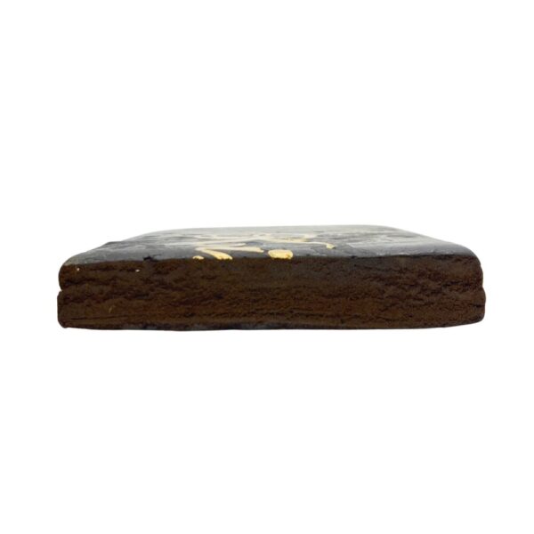 King Kush Hash cut in half on a white background