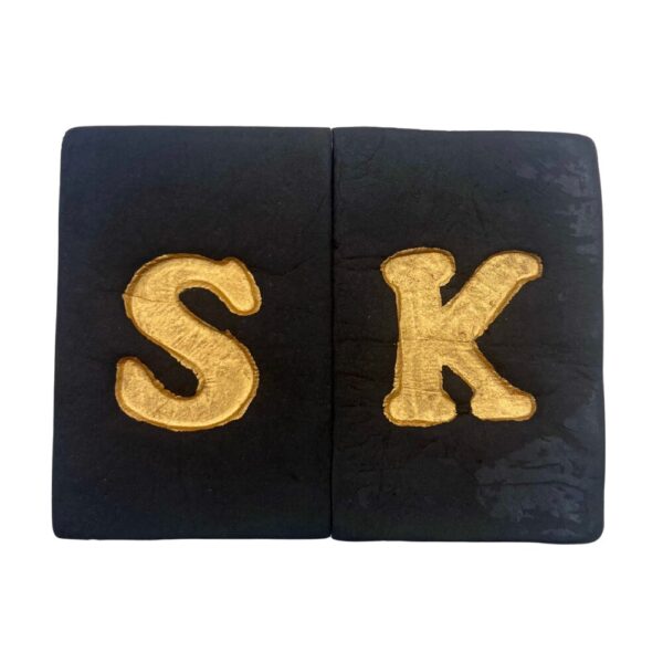 An image of two blocks of Strawberry Kush Hash