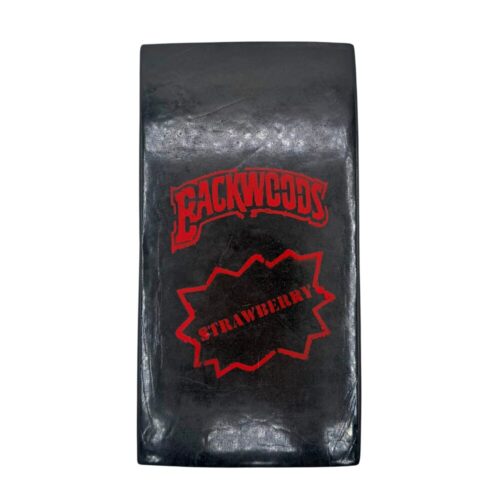 Brick of Strawberry Hash with a "Strawberry Backwoods" red stamp pressed into the surface, propped up on a clean white background