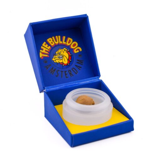 An image of 2 grams of Magik – Amsterdam Bulldog Blonde Hash in its opened, branded packaging on a clean white background