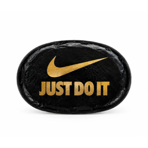 Nike Hash with a gold “Just Do It” stamp and checkmark on a white background
