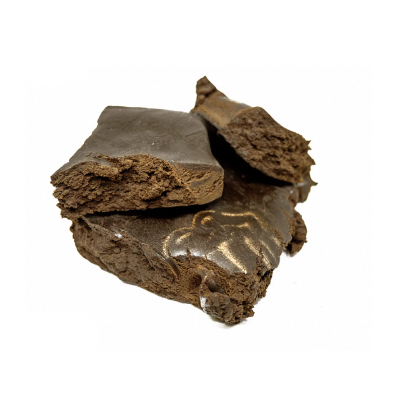 An Image of Afghan Hash broken open on a white background